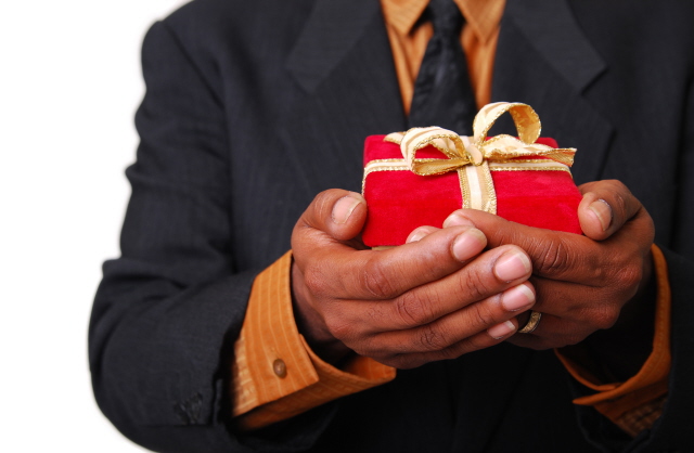 Man Holding Christmas Gift